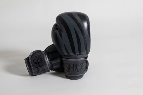 A minimal black on grey zebra print on our elegant black leather boxing gloves